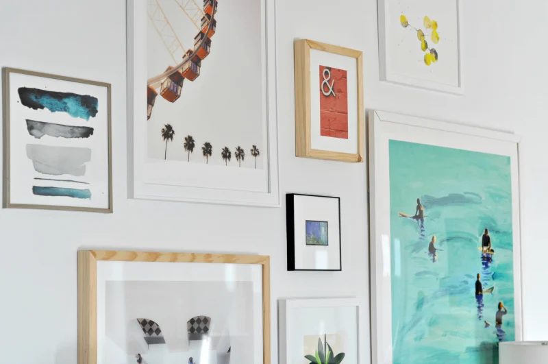 Tips for Arranging Art on a Gallery Wall by House Updated featured on Bekob