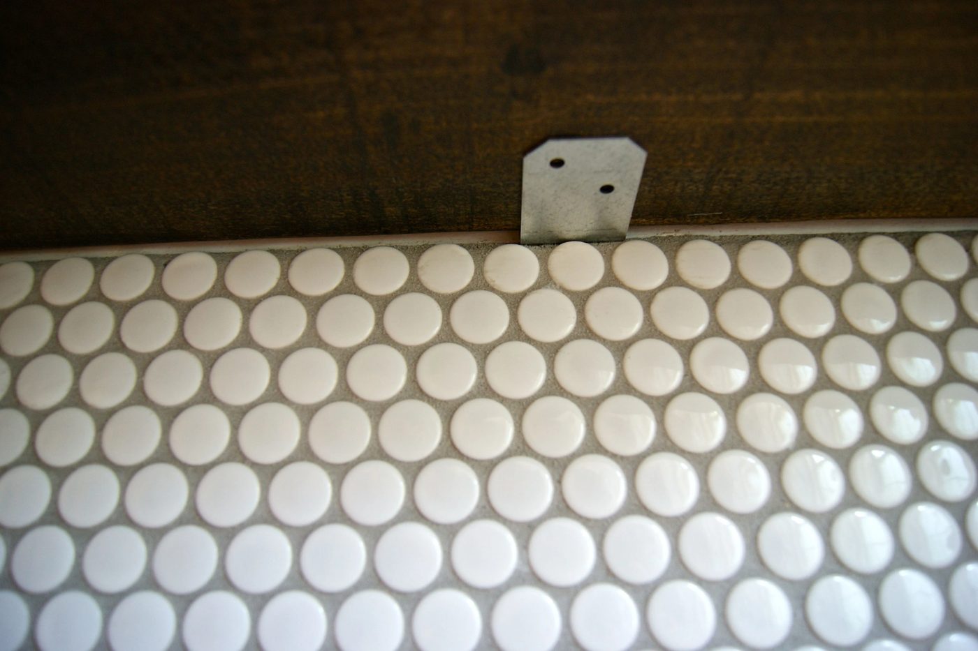 Handmade penny tile backsplash install