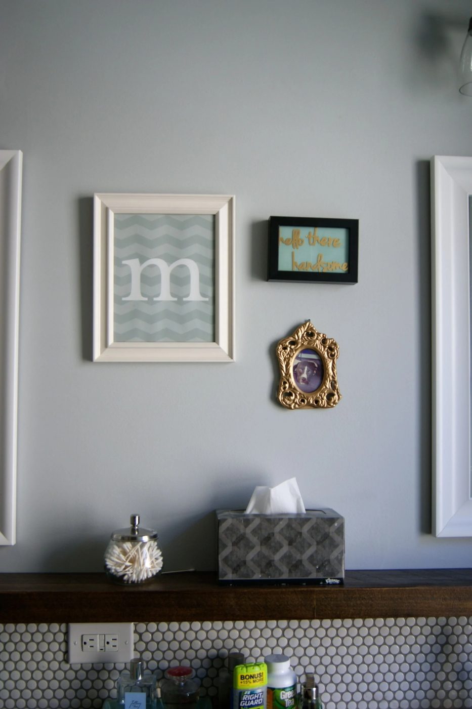 bathroom makeover with penny tile and floating wood shelf