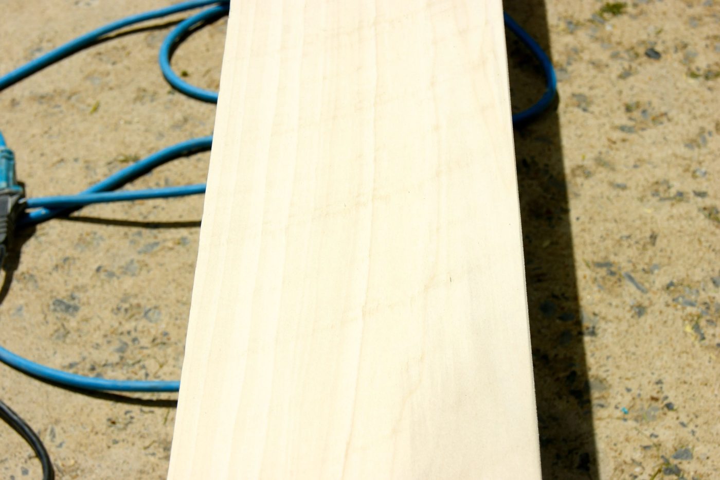 cutting a straight line for a floating shelf using a circular saw