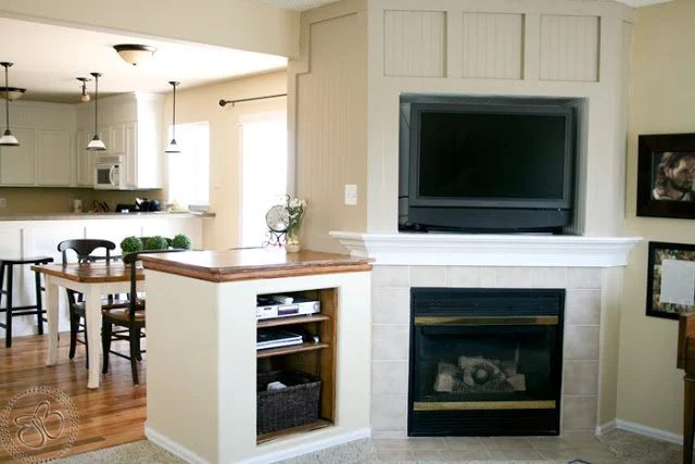 Wood Panel Fireplace Redo for a corner fireplace remodel