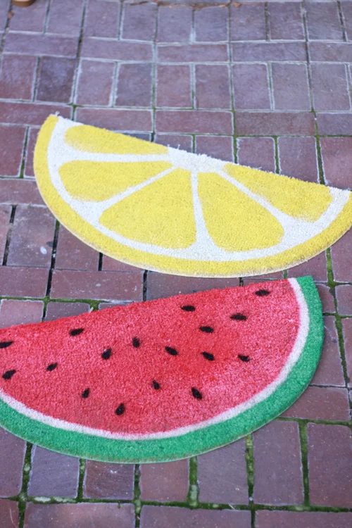 Handmade fruit welcome mats, The House That Lars Built
