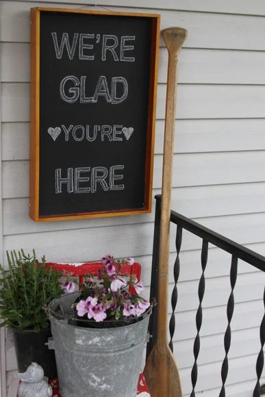 welcome guests with a chalkboard serving tray sign, A Spotted Pony