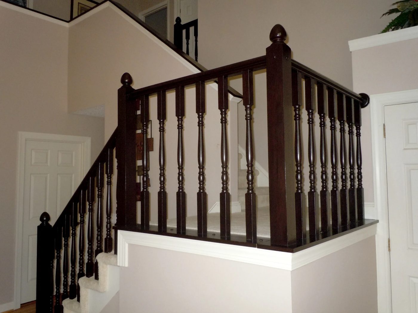 Handmade staircase makeover with gel stain on a dated old oak banister