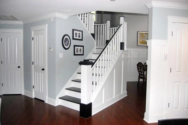 painted Handmade staircase makeover with new wood plank stair treads and landing