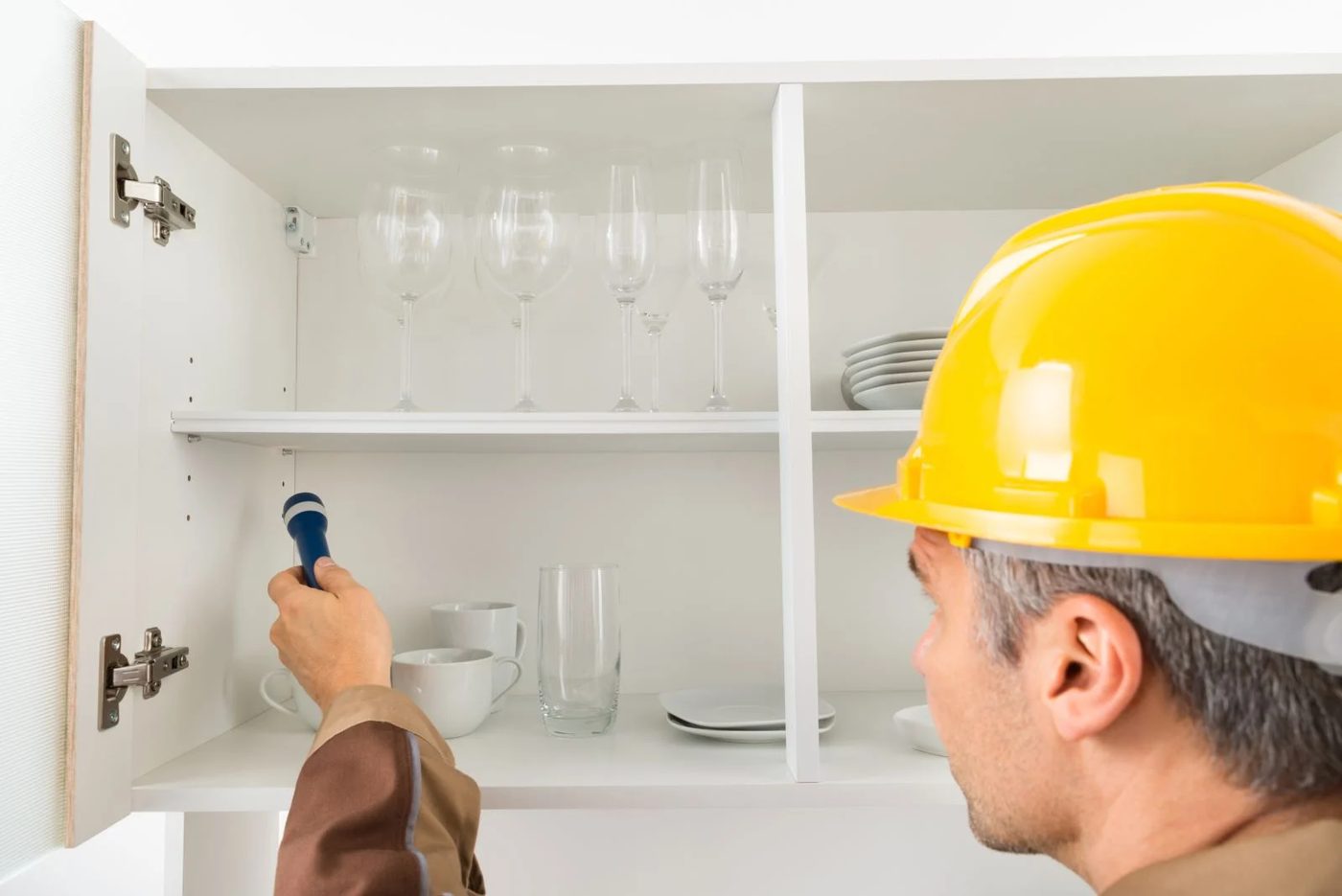 Man Inspecting