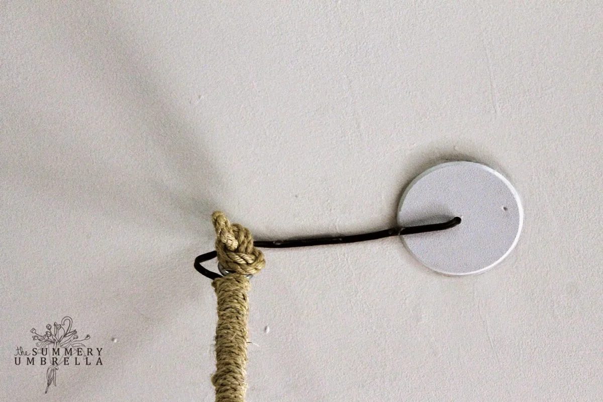 use rope to hide a rustic chandelier cord - The Summery Umbrella featured on @Bekob