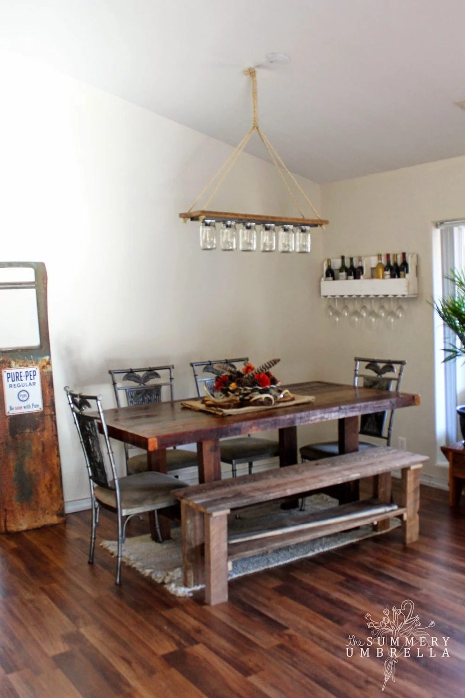 rustic reclaimed dining room with upcycled mason jar chandelier - The Summery Umbrella featured on @Bekob