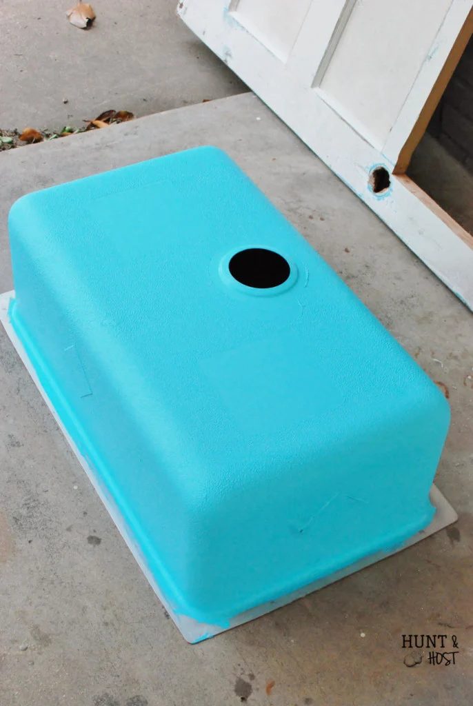 Handmade Salvaged sink and old wooden door make a unique, handy outdoor table by Hunt and Host featured on @Bekob
