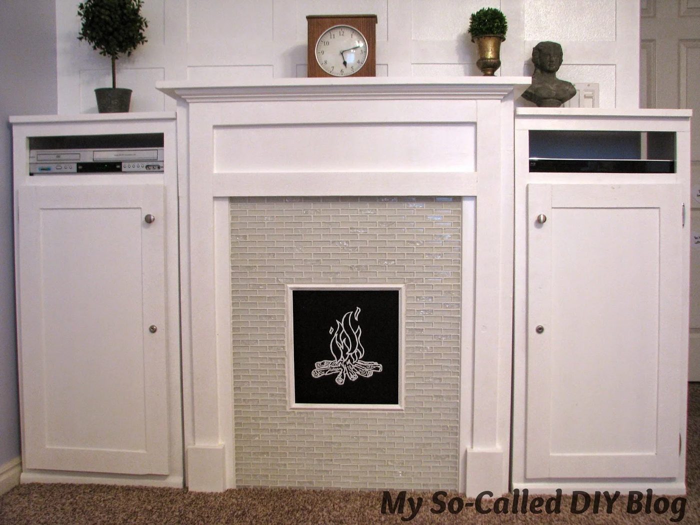 faux fireplace and built-in cabinets - My So-Called Handmade Blog on @Bekob