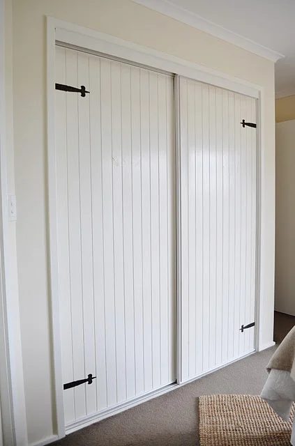 flat closet doors updated with beadboard and hinges via AKA Design