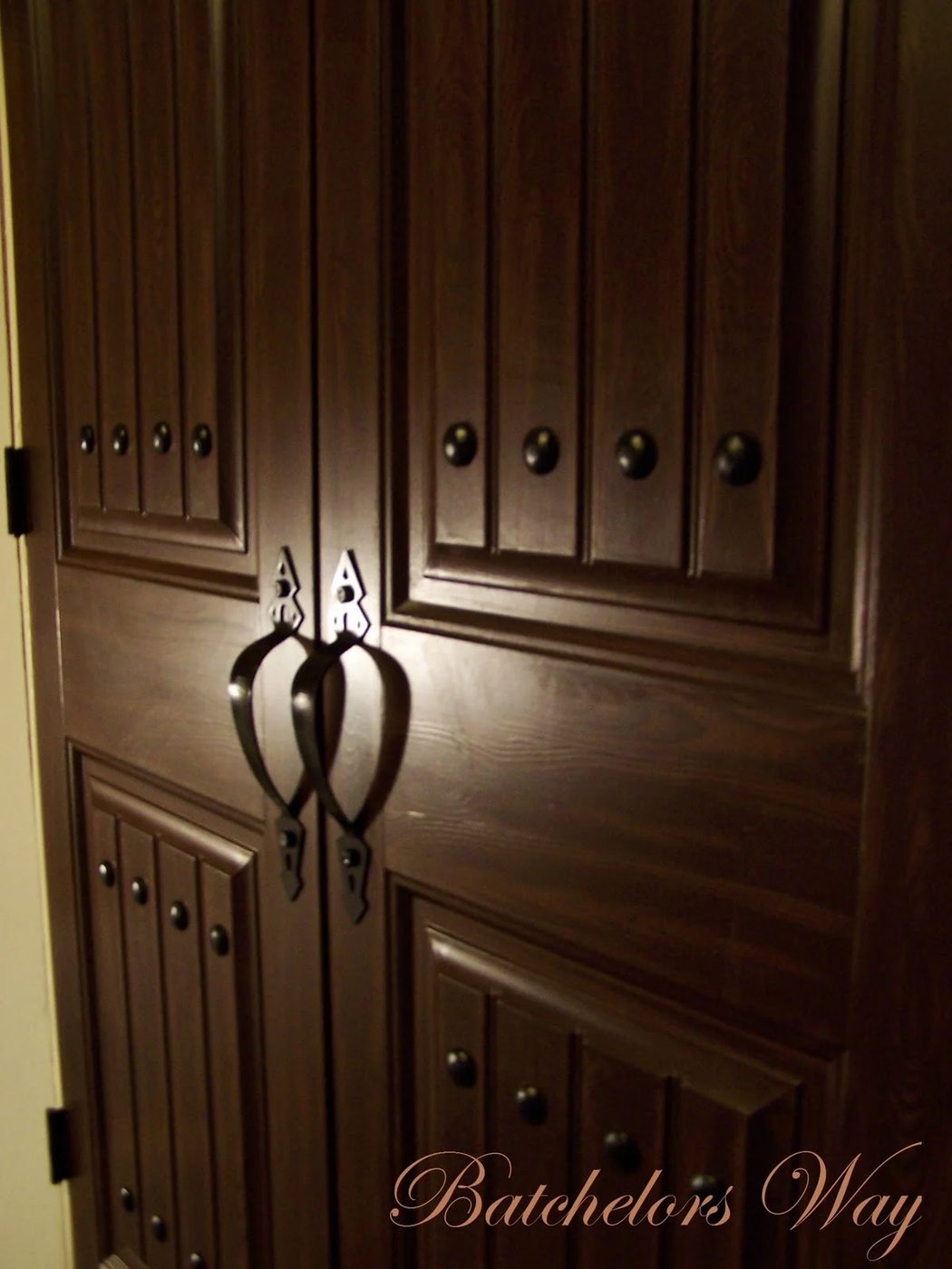 closet doors painted and glazed with hardware