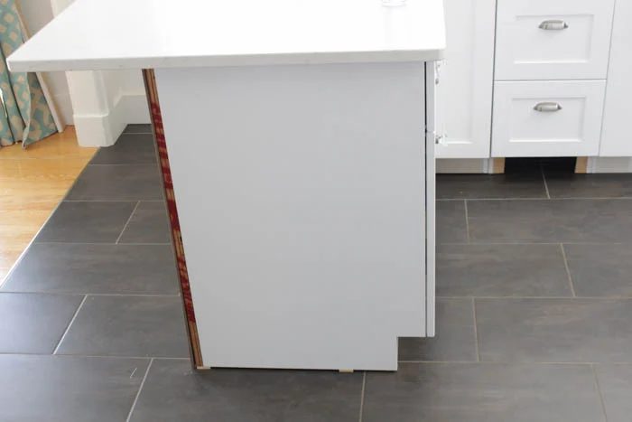Planking-the-Kitchen-Island-Peninsula-and-adding-corbels-at-thehappyhousie.com-3
