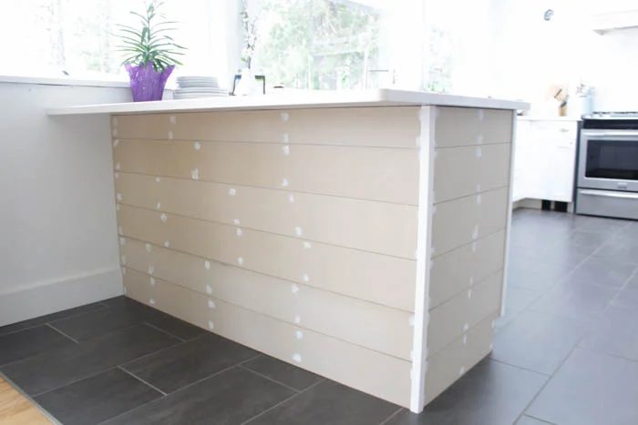 prepping a planked kitchen island for paint -- fill the holes and sand, The Happy Housie on @Bekob