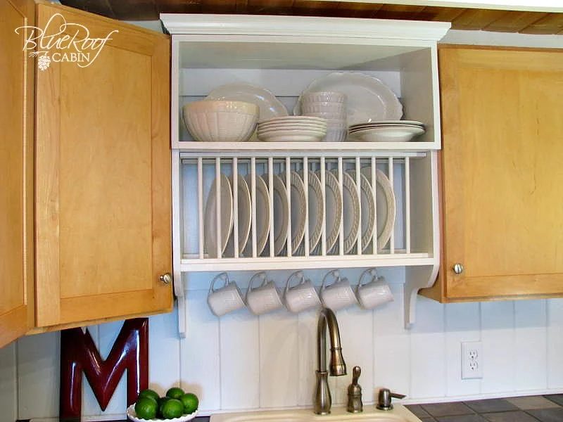 mix builder grade and custom cabinets with a custom plate rack shelf and cabinet