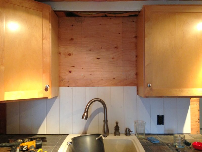 tearing out the cabinets