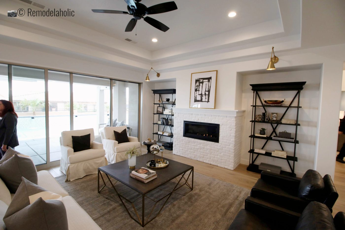 direct neutral living room. SGPH 2019 House 07 Brio Homes LLC, Photo by Bekob