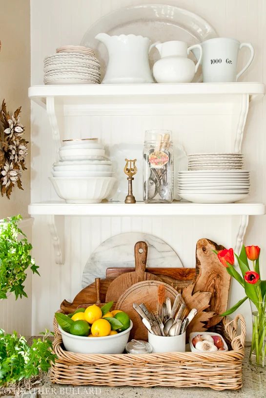 kitchen tray with cutting boards and silverware Heather Bullard