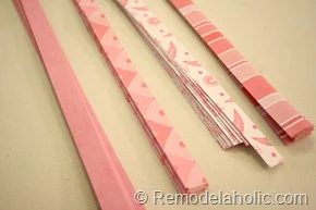 Cutting out scrapbook paper for a fun craft project