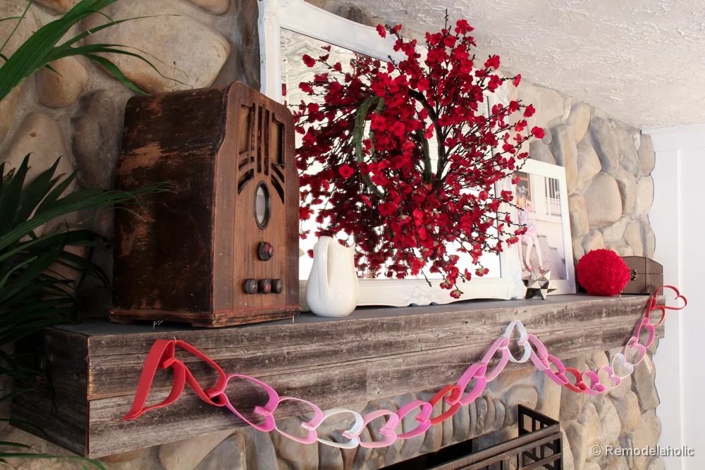 Valentines mantel and TV in fireplace (3 of 8)