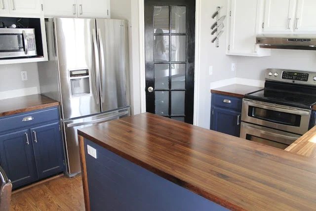white and wood kitchen with navy cabinets, Chris Loves Julia
