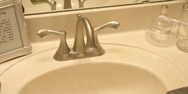 Wash up! Time for a brand new Delta Faucet!! YEA!