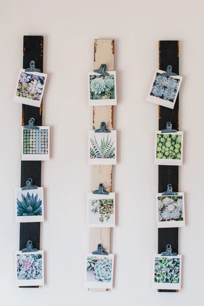 direct boards and metal clips photos display (via Design Sponge)