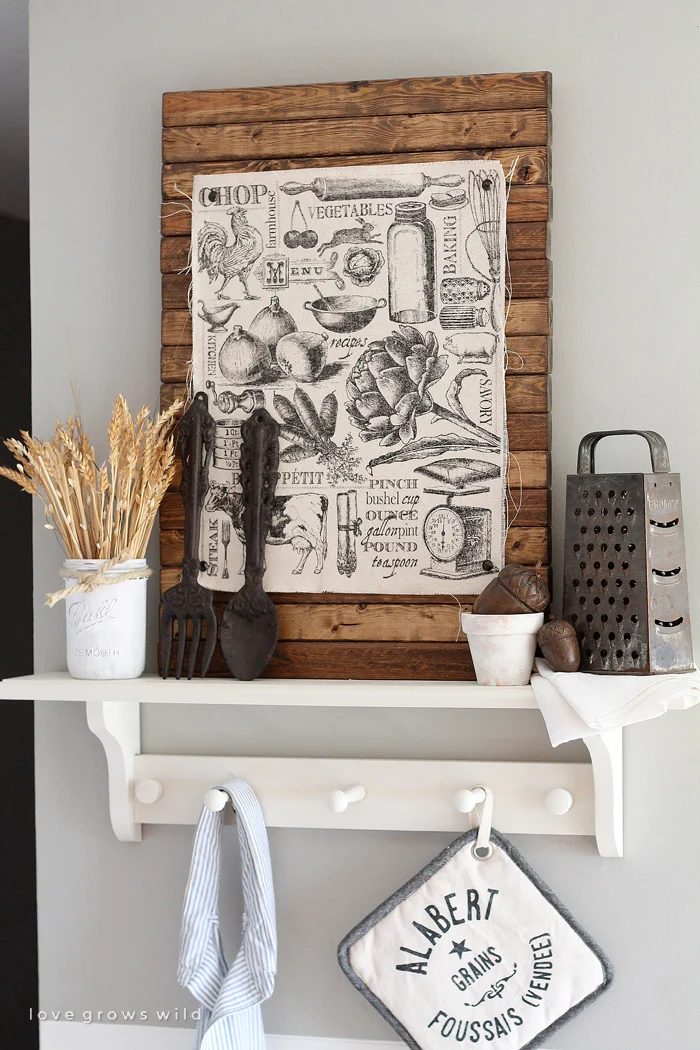 print on fabric and pin to a wood pallet piece (Love Grows Wild)