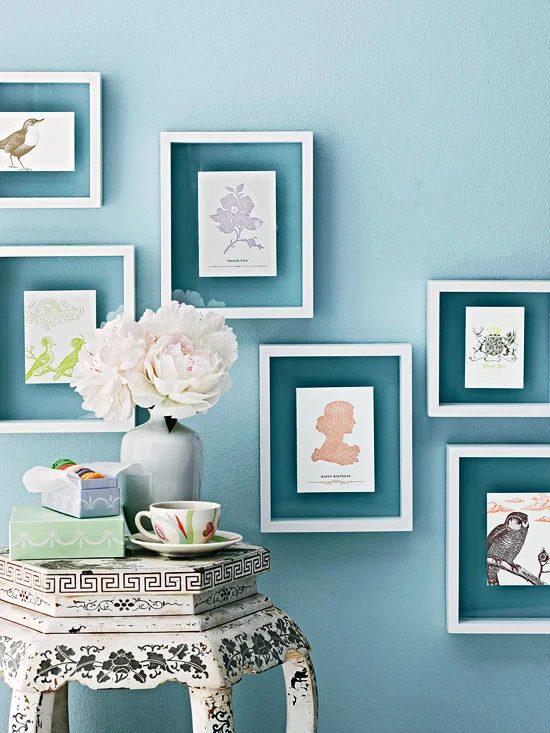 frame cards and small art prints or photos with floating frames (BHG)