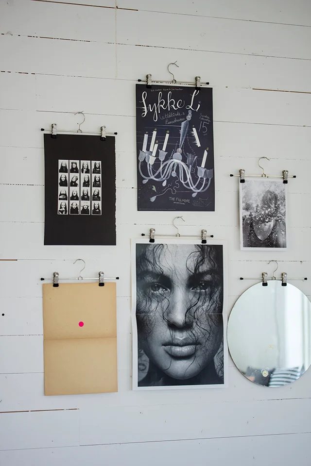 use clip or pants hangers to display photos or printed posters (By Fryd)