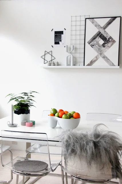 framed print with a floating print taped to the wall behind the shelf (mittogvaarthjem)