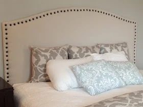 dropcloth headboard with nail head trim