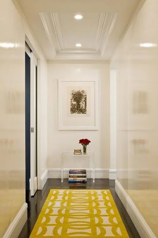 Decorate A Hallway Yellow Runner Rug With Table And Art Via Splendid Sass