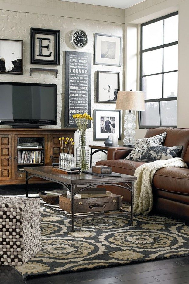 contemporary black and white gallery wall around the TV