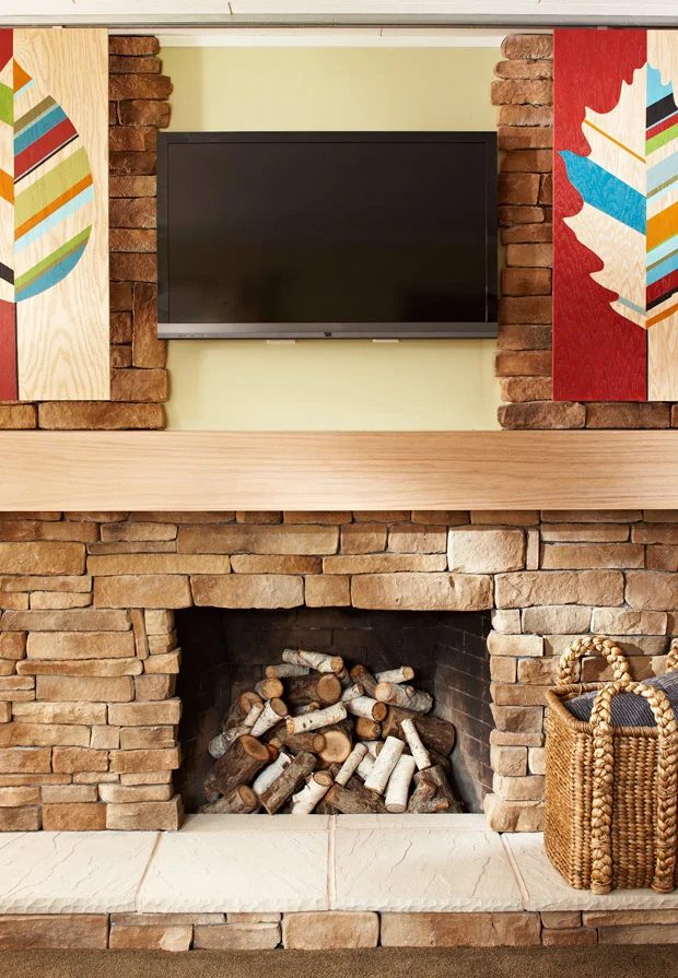 sliding artwork to hide television, using inexpensive closet slides (Lowe's Creative options)