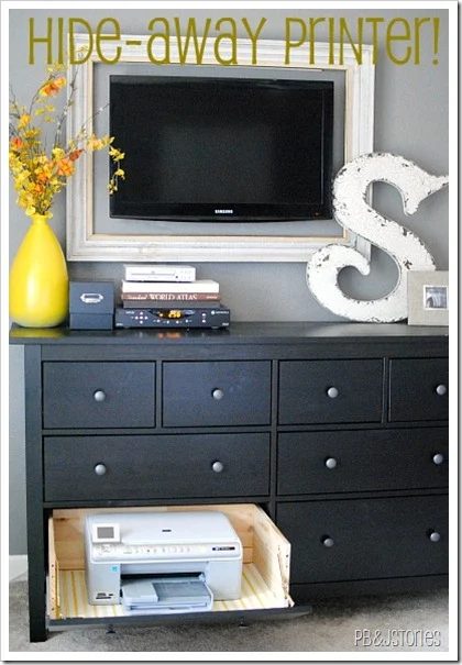 hide a printer in a dresser with a framed tv - could work with game systems or other electronics too (PBJ Stories)