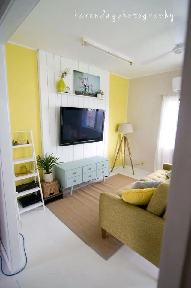 vertical planked accent wall to mount tv and hide cords
