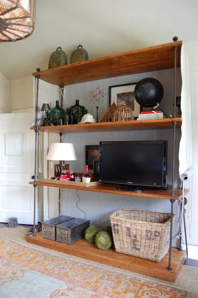 disguise a TV in a large shelving unit (Habitually Rustic)