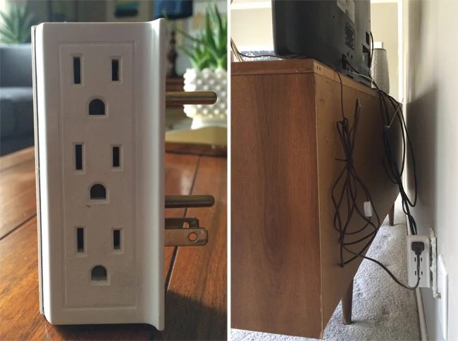 use a multiple prong outlet and zip ties to hide cords behind a TV console (Bigger Than The Three Of Us)