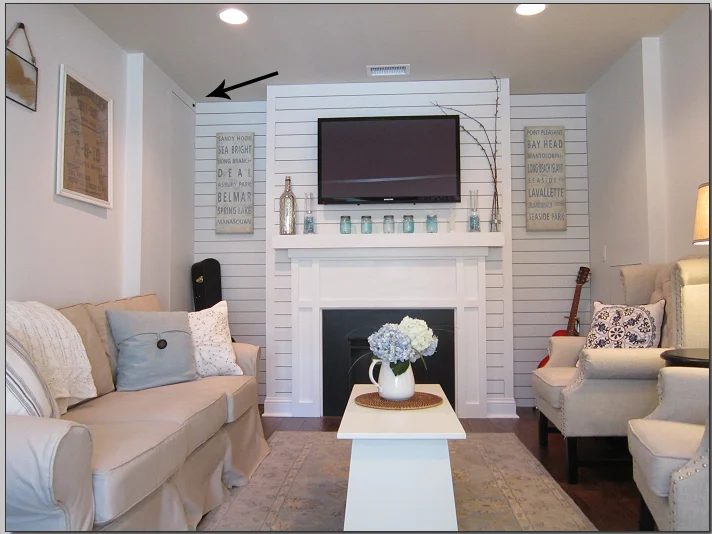 hide cable box and electronics and use an IR remote to cut TV clutter (The Honeycomb Home)