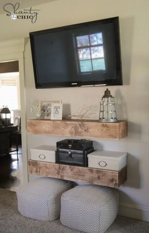open floating media shelves under the TV (Shanty2Chic)