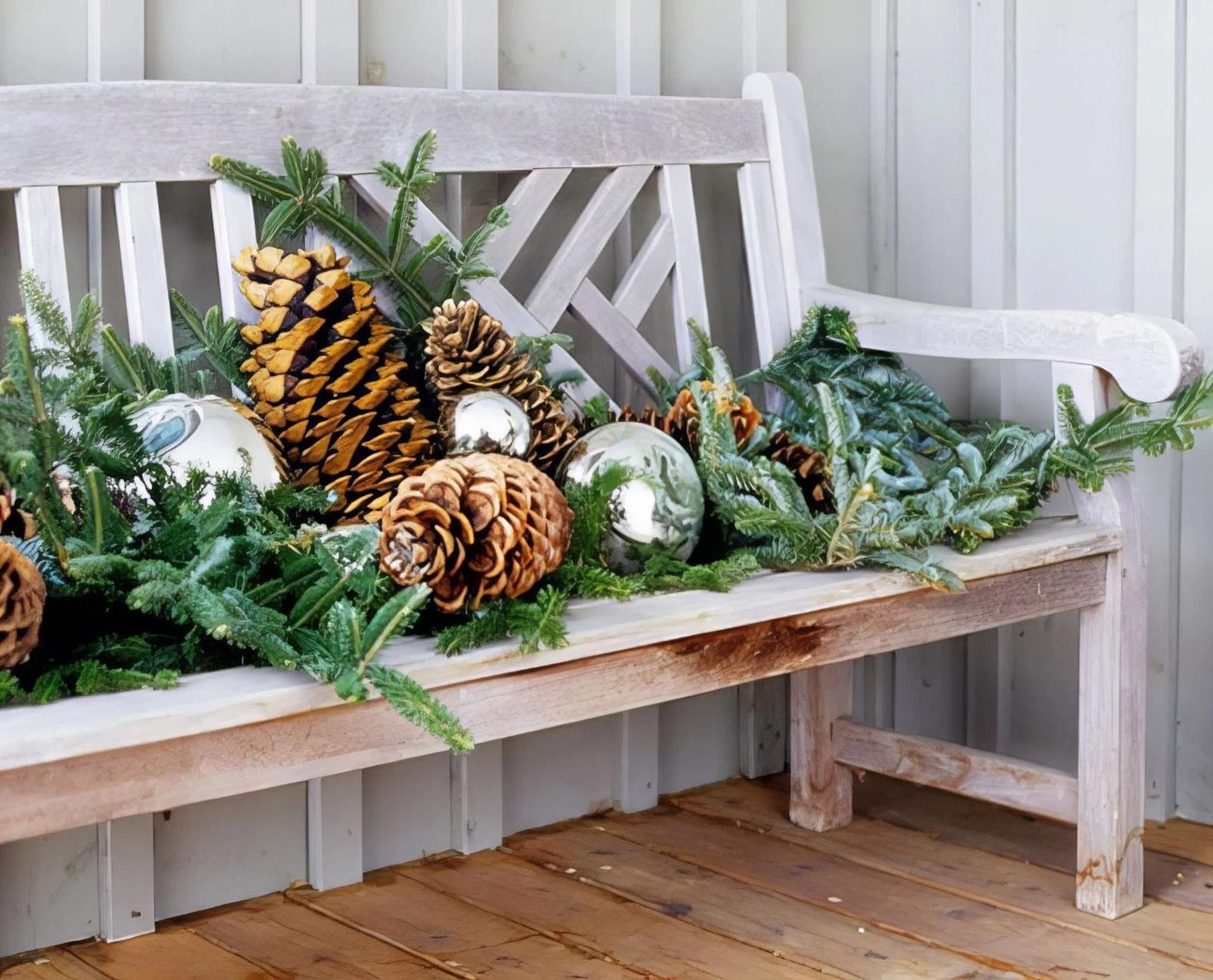 Fresh Evergreen Branches On An Entry Porch Bench BHG Via @Bekob 033104