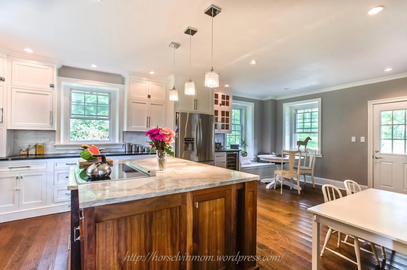 white country kitchen remodel with pendant lights, featured at Bekob.com