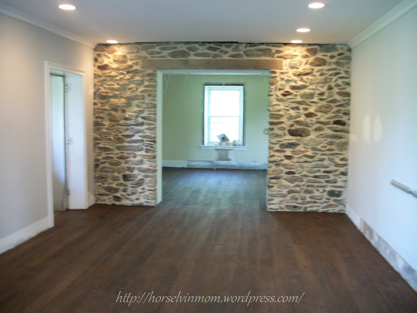 white country kitchen remodel with wood flooring, featured at Bekob.com