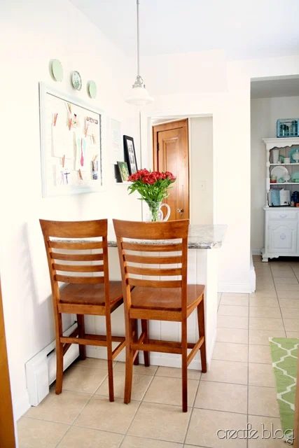 new white kitchen island from thrifted cabinets