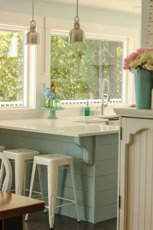 striking kitchen with an straightforward island update - just add planks and corbels for some lovely coastal texture and style, The Happy Housie on @Bekob