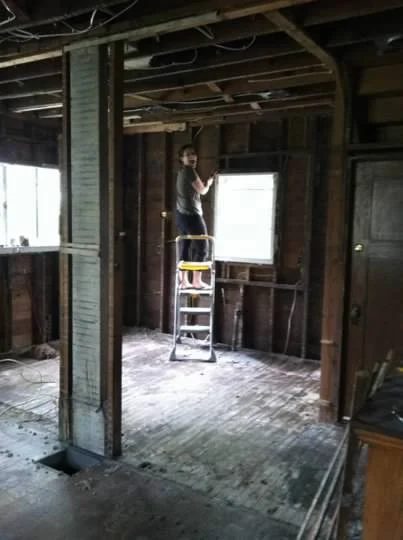 Wow, this kitchen was a LOT of work but it was SO worth it! I love the cabinets and backsplash and that brick wall!!
