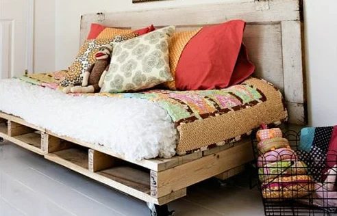 straightforward-handmade-pallet-daybed-with-old-door-headboard-ashley-ann-photography