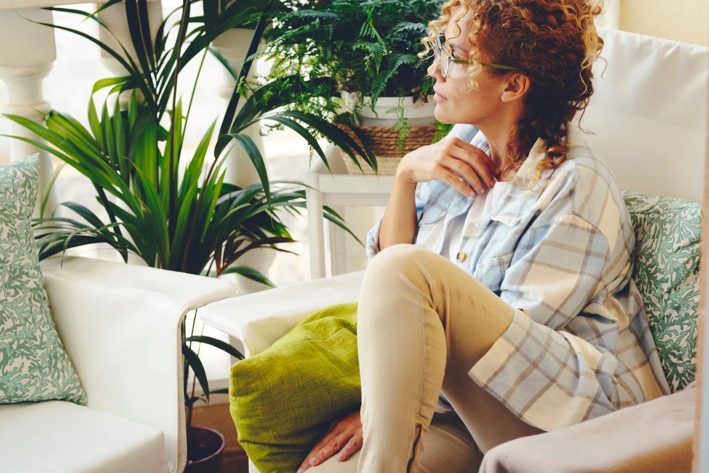 Thoughtful Woman With Plants