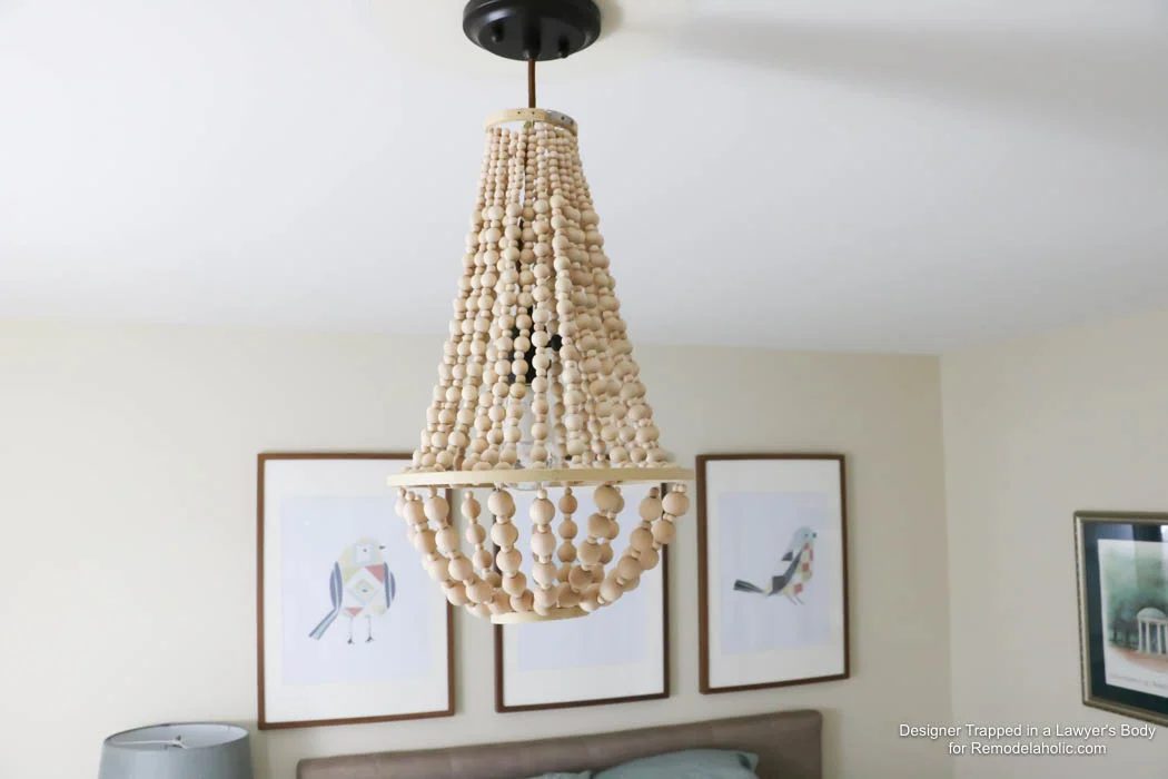 WOW! Come learn how to make your own wood bead chandelier with this solid walkthrough by Designer Trapped in a Lawyer's Body for Bekob.com!